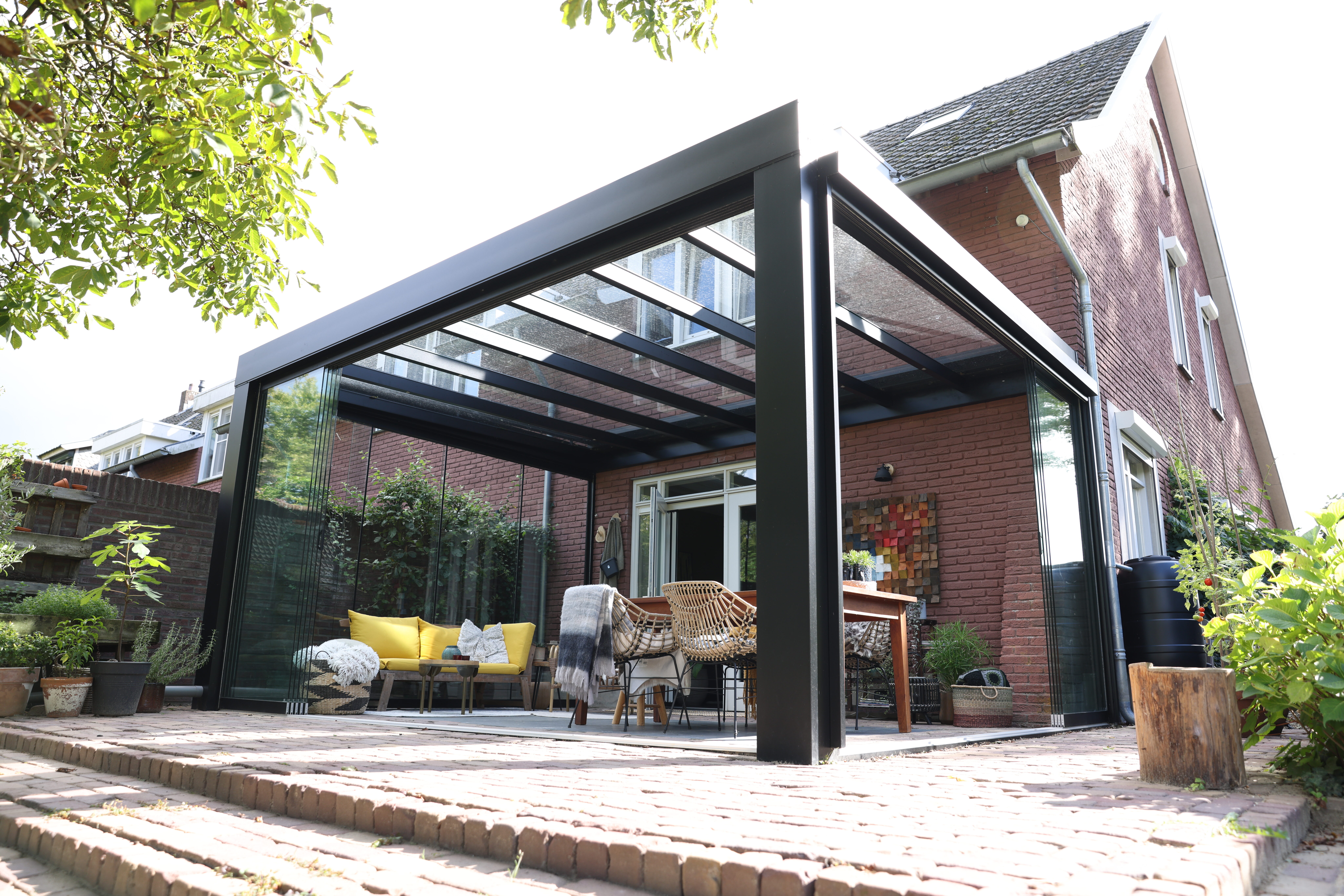 Van terrasoverkapping naar warme tuinkamer Van terrasoverkapping naar warme tuinkamer