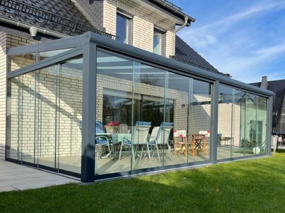 Tuinkamer met glazen schuifwanden Tuinkamer
